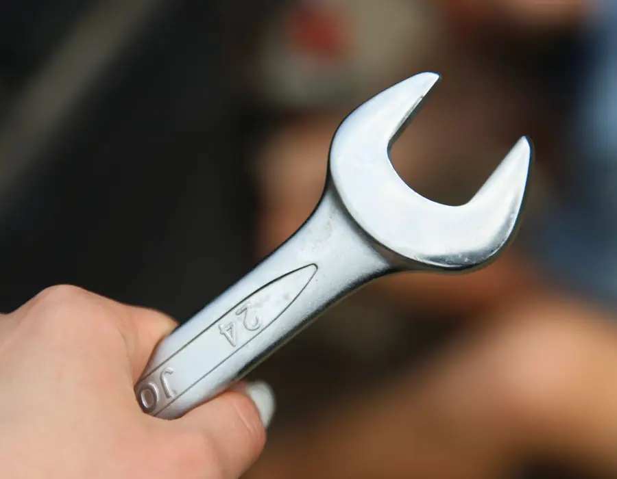 A spanner on a workbench